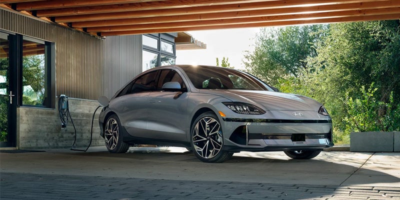 Hyundai IONIQ 6 charging at a station