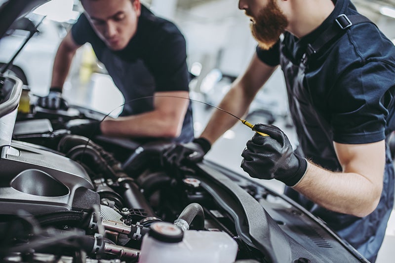 Service technician working on a vehicle - Fitzgerald Hyundai of Rockville in Rockville MD
